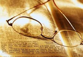 Open Bible with Eyeglasses